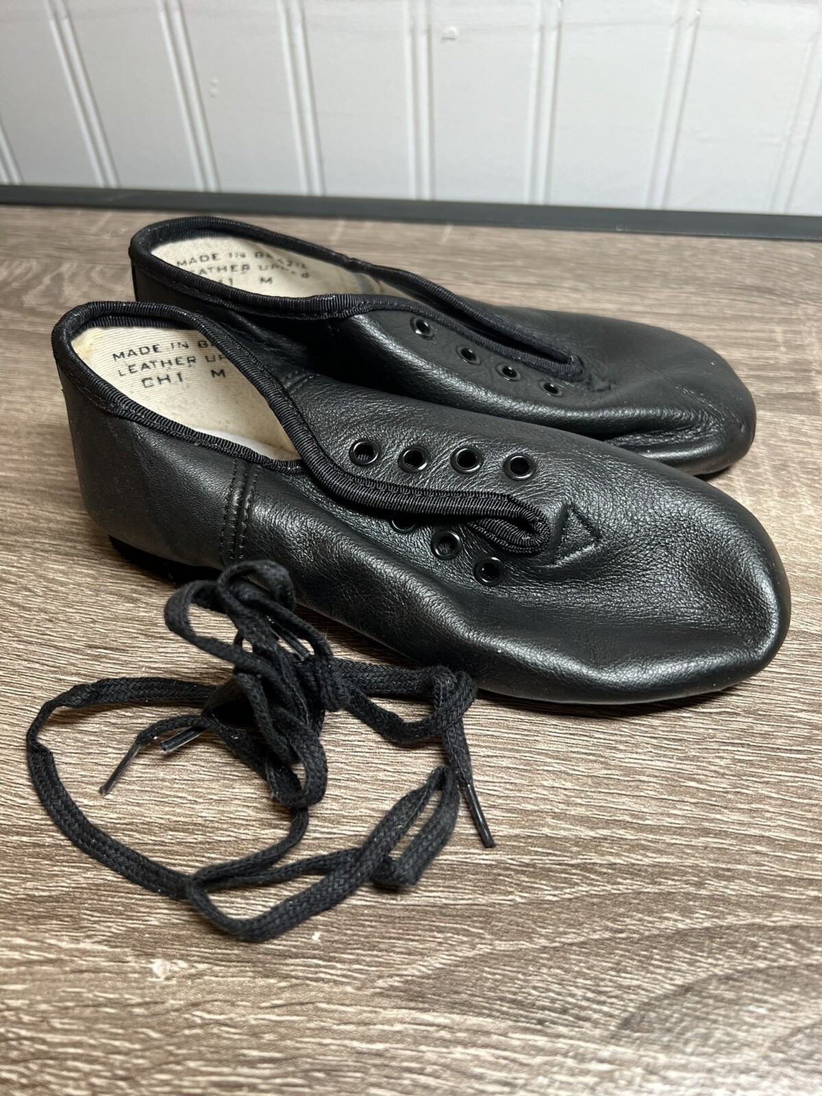 SAOLA Pantofola nuova vecchia stock bambino Brasile suola divisa in pelle nera 1 M