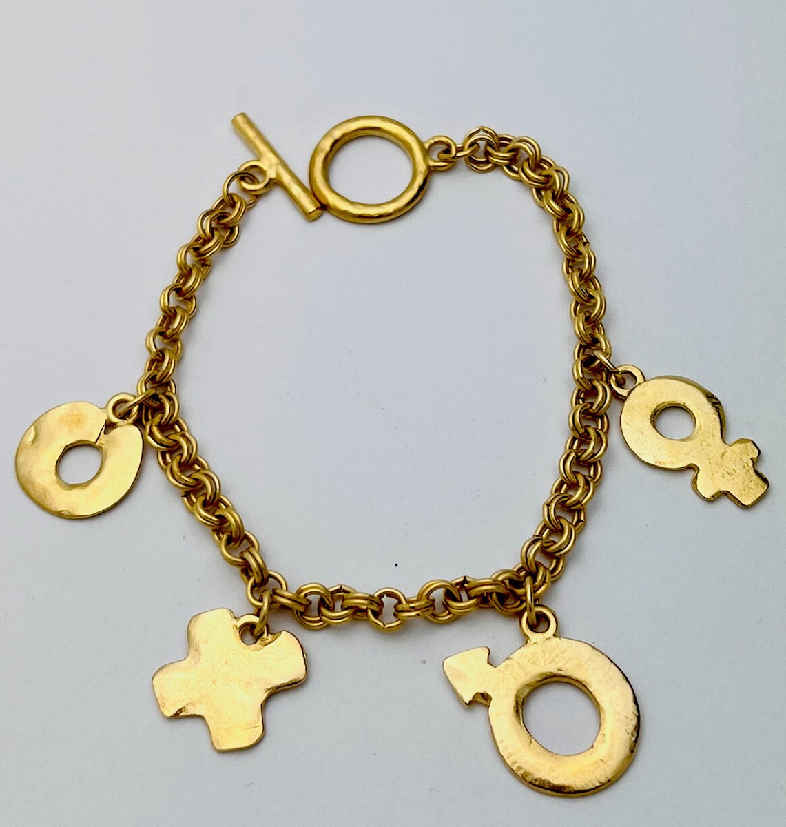 Vintage 1980-90s Matte Gold Tone Male Female XO Charm