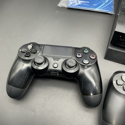 Sony PlayStation 4 500GB Game Console with GTA V and The Last of