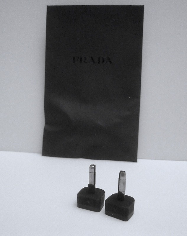 PRADA SPARE HEEL LIFTS, BLACK