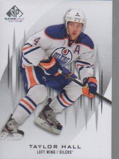 TAYLOR HALL  2013-14 SP GAME USED CARD #68