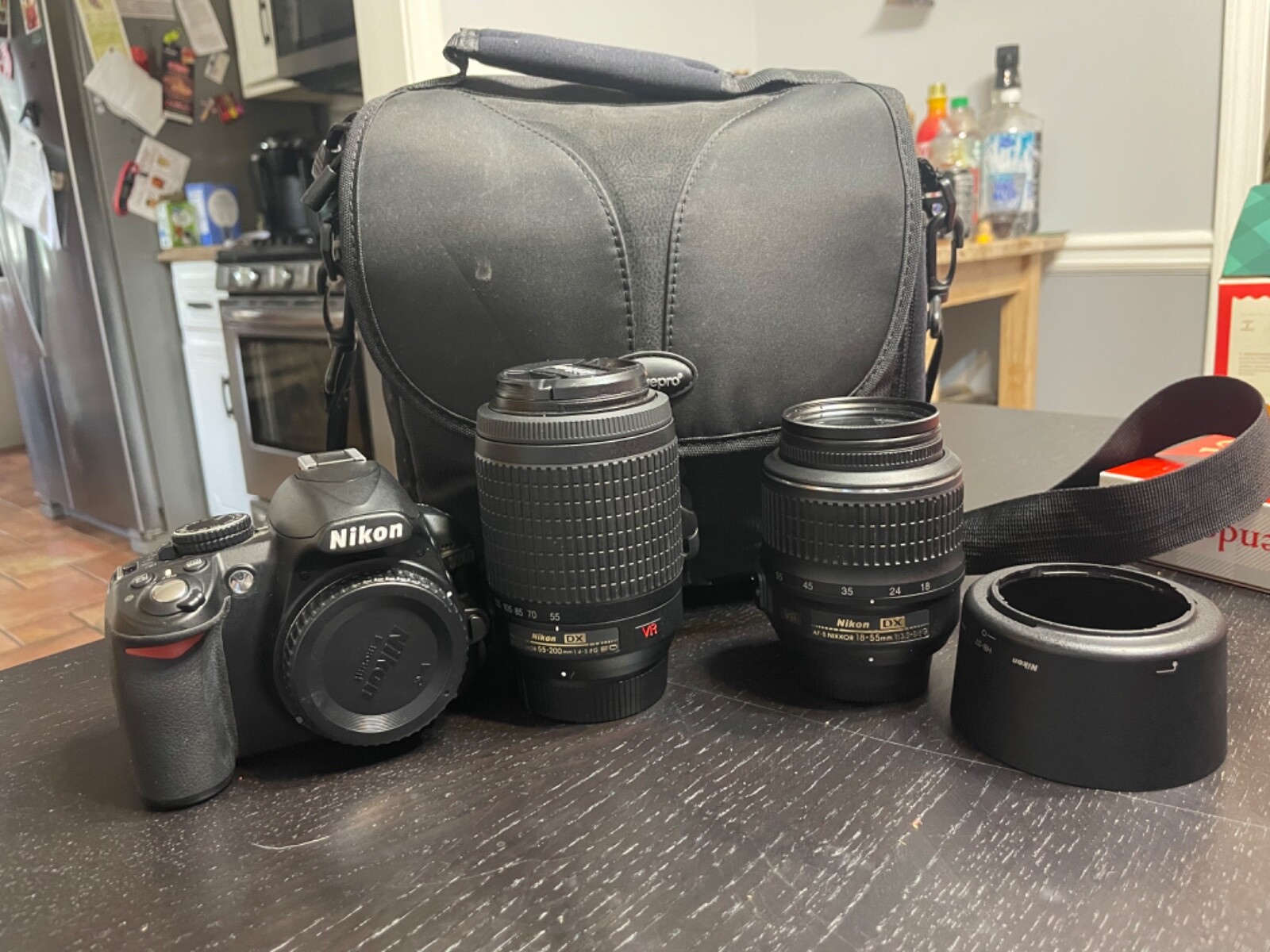 Nikon D3100 with 2 lenses (1855 and 55200), Lowepro case, and HB37 hood eBay