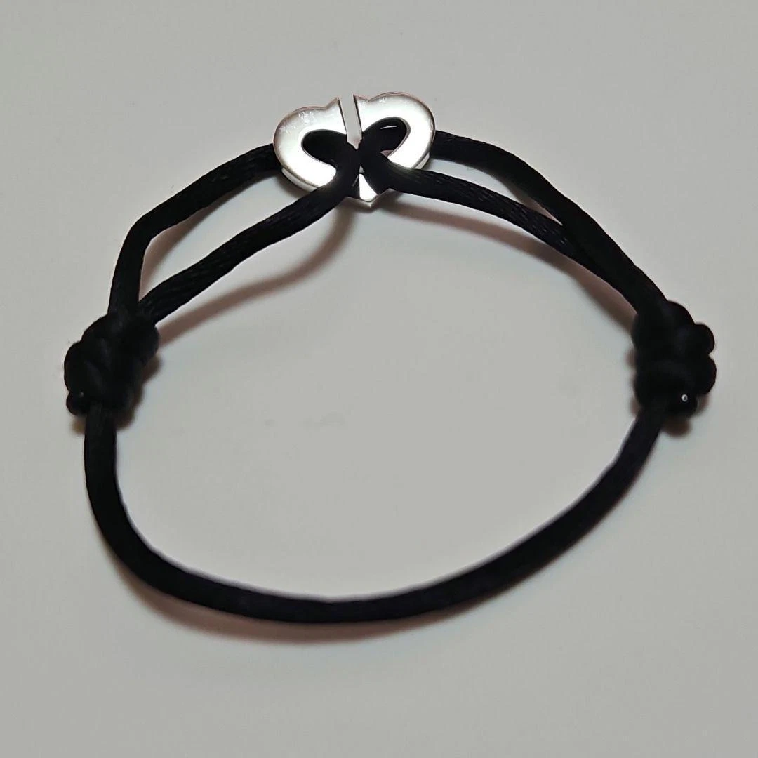 Cartier bracelet black rope deals