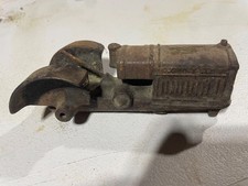 Antique McCormick Deering Cast Iron Toy Tractor no wheels