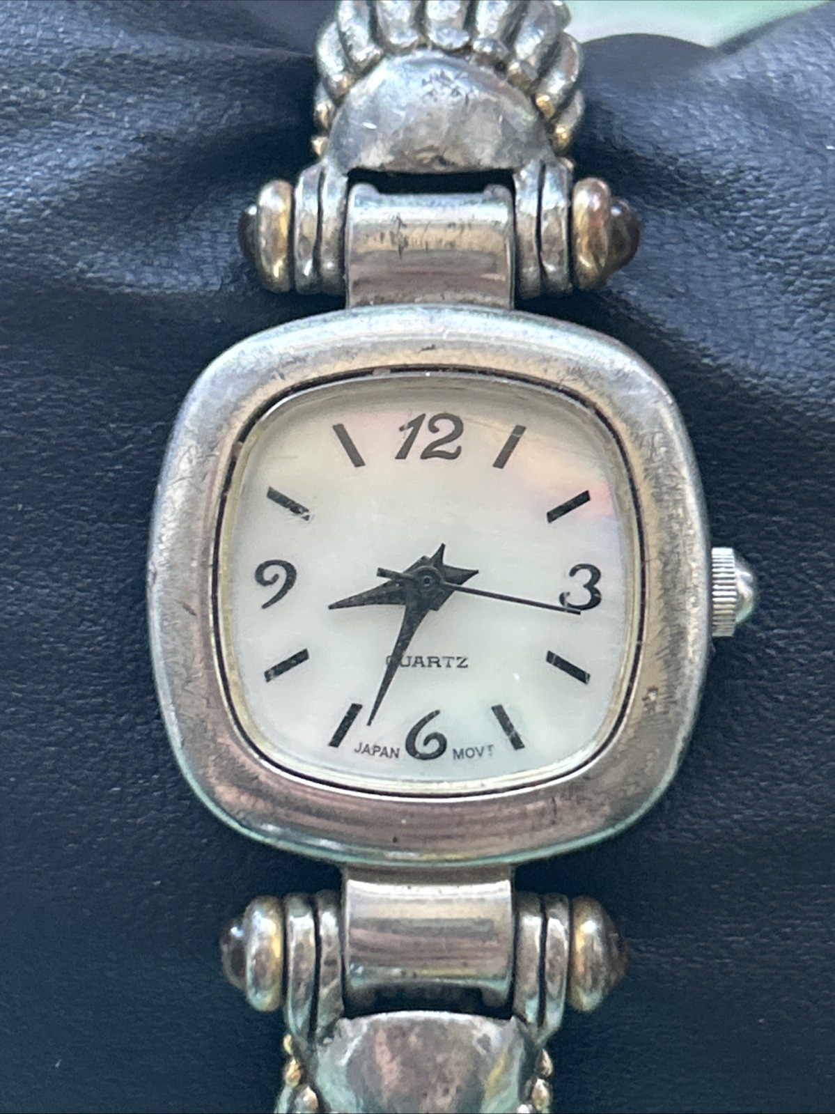 Silver Tone MOP Dial Women’s Cuff Watch