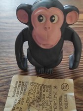 Vintage Soviet wind-up USSR Monkey figurine with documents.