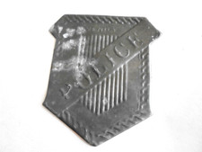 Insignia antigua de juguete de hojalata de policía juvenil - sin alfiler