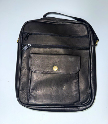 Genuine leather Blk + body Adjustable Strap Pockets/zip closure. Made in ecuador
