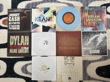 7”  Lot - Dylan, Cash, Bright Eyes, Kane, LaMontagne, Kings Of Leon, Ryan Adams