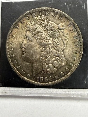 1884 O Morgan Silver Dollar $1 Circulated Toning 0.9 Fine Silver Coin