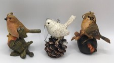 Christmas set of 3 ornaments 4.5  Resin birds on pinecone chestnut flower pod