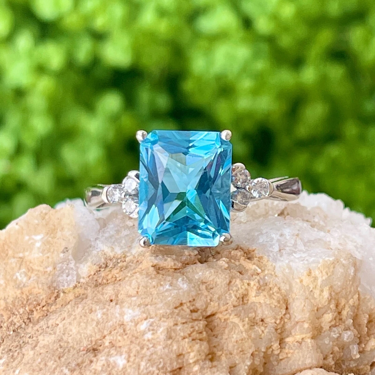 Diamond engagement rings store with blue topaz accents