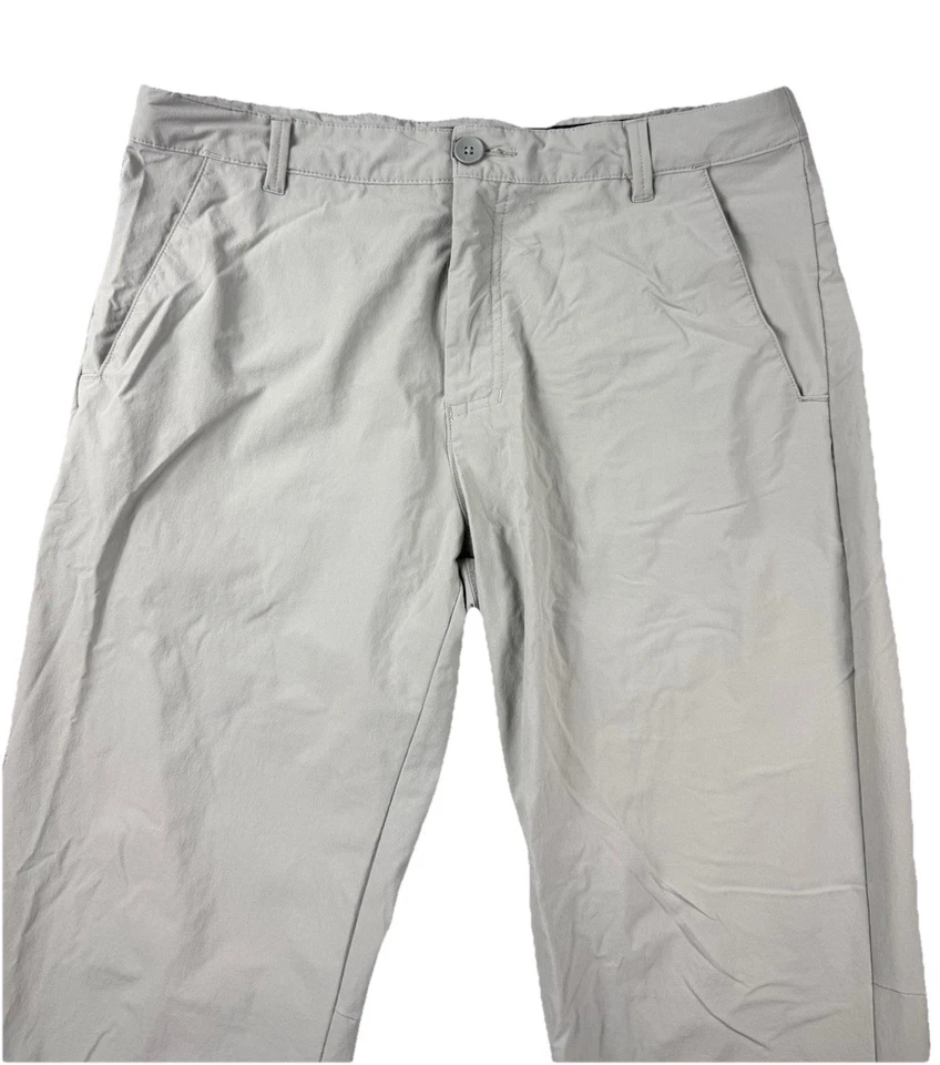 Pantalones elásticos de rendimiento de golf Oakley 33x30 gris calce regular para hombre Foto 2 de 4