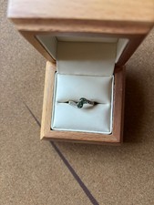 Gold Ring with Emerald and Diamond Twisted Design