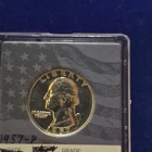 1957 Silver proof quarter.