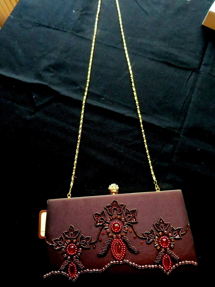 Dark tan deals clutch bag