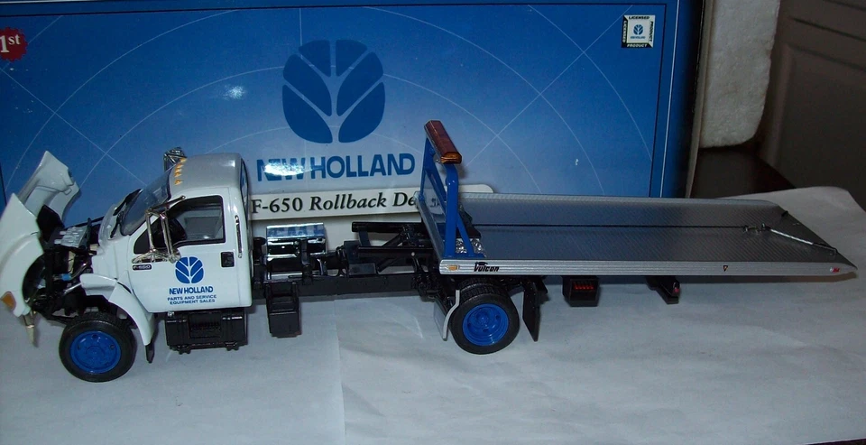 Camión de reparto retroceso Ford F650 1/34 equipo New Holland Foto 2 de 4