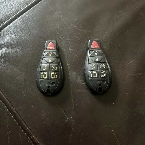 OEM 2008-2020 DODGE GRAND CARAVAN KEYLESS REMOTE KEY FOB ALARM IYZ-C01C set of 2 - product listing photo