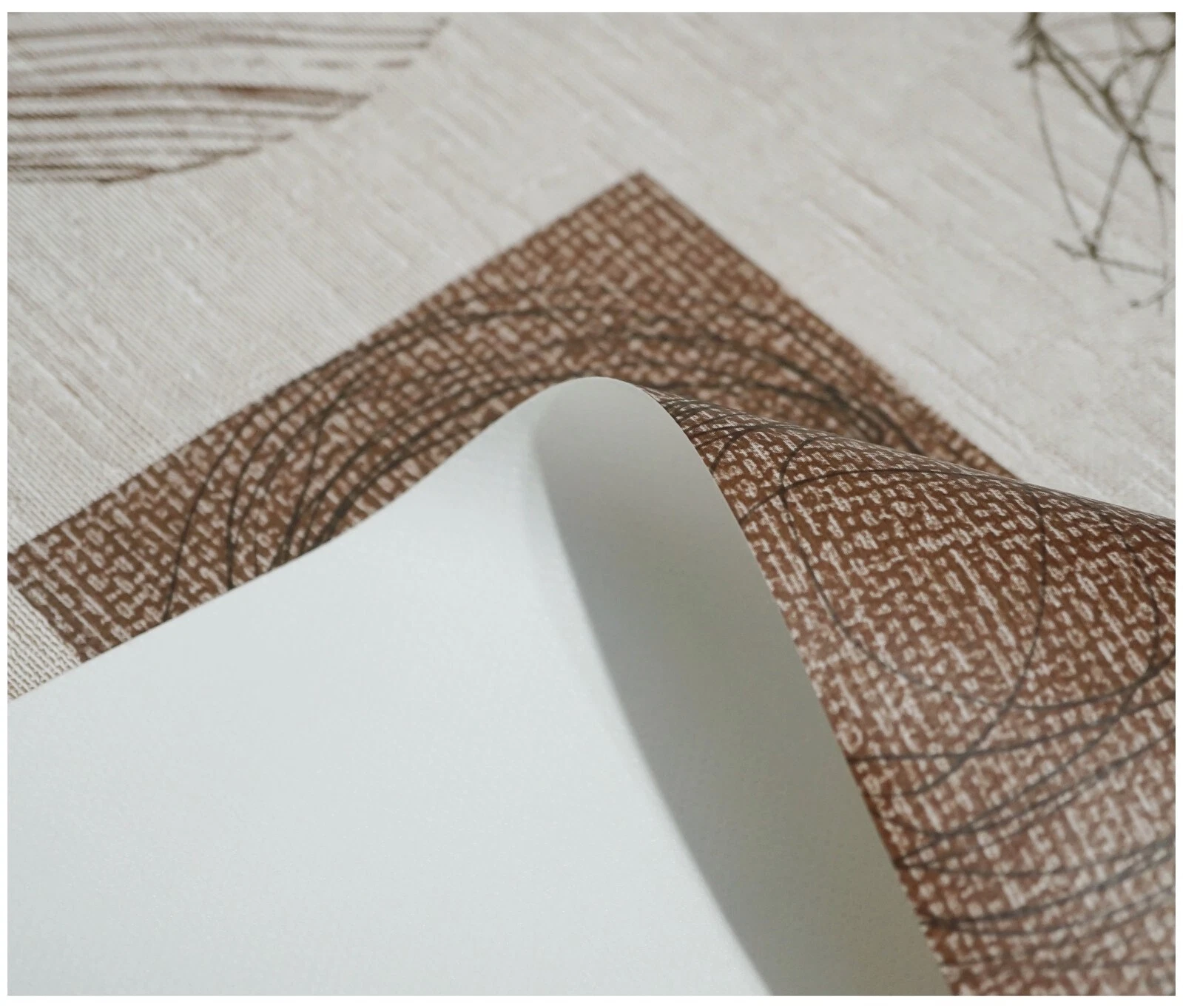 Close-up of wipe-clean PVC tablecloth surface and printed design