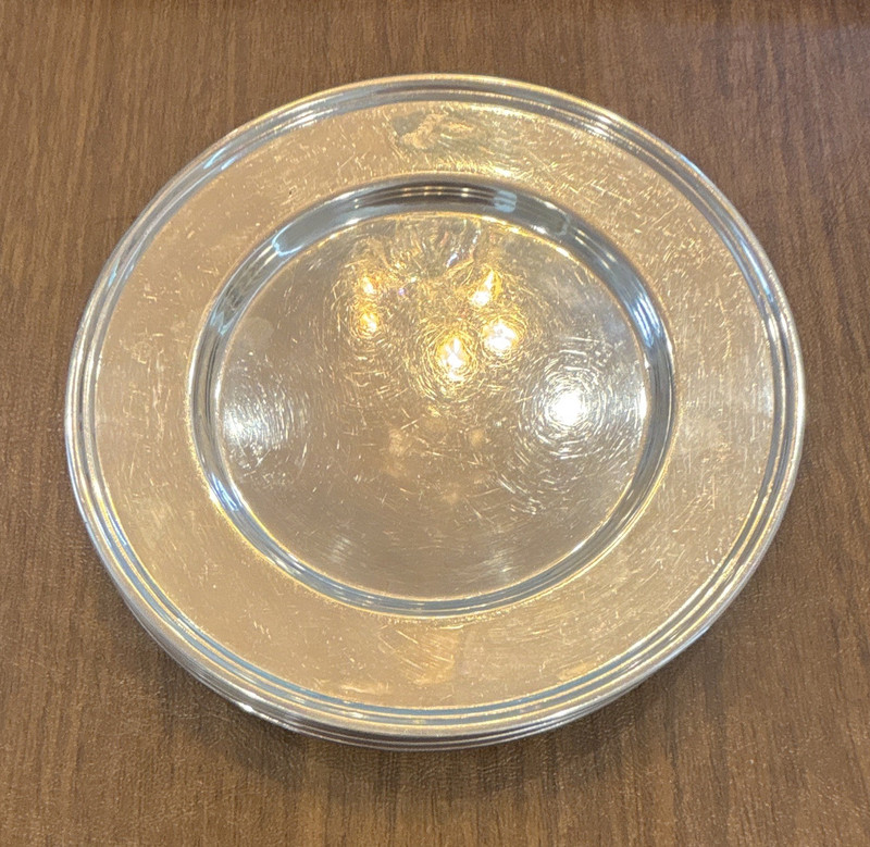 Sterling silver plates. 6 3/8” (6). 449 grams.