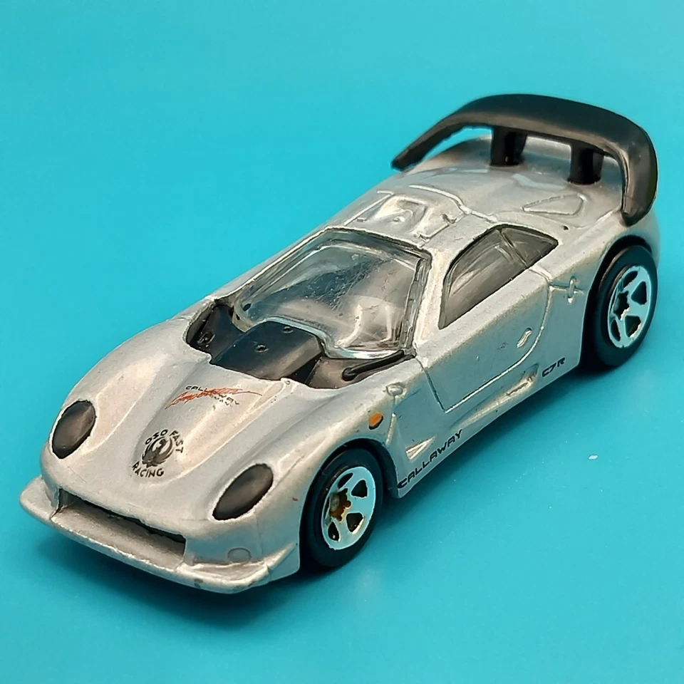 Coche de carreras Hot Wheels Callaway C7R escala 1:64 gris plata diecast juguete coleccionable Foto 3 de 4