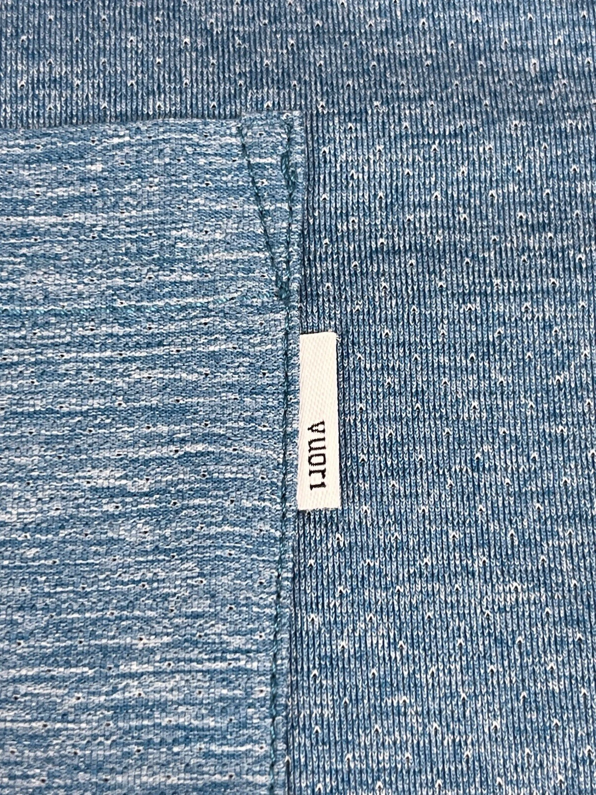 vuori heather tradewind pocket performance gym shirt