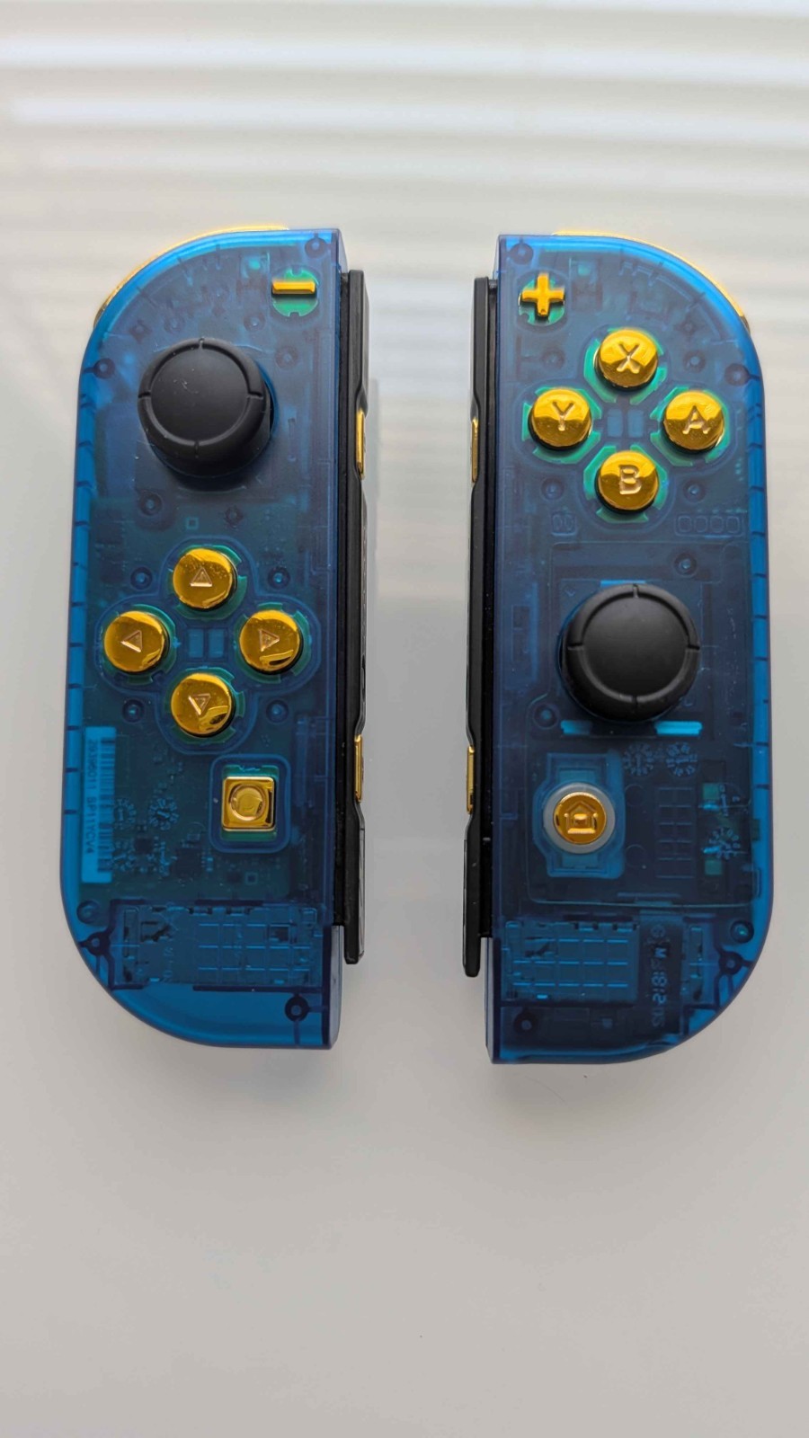 Nintendo Switch Clear Blue Rehoused Joy-Cons with Gold Buttons