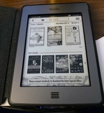 kindle 4th generation/ Works Perfect, Bundled With Case. Good Deal