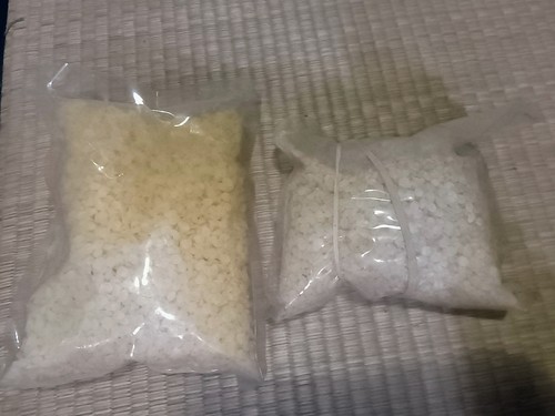 1.75 lb lot yellow Beeswax pellets. 1 lb bags, open condition. 1.75 lb total
