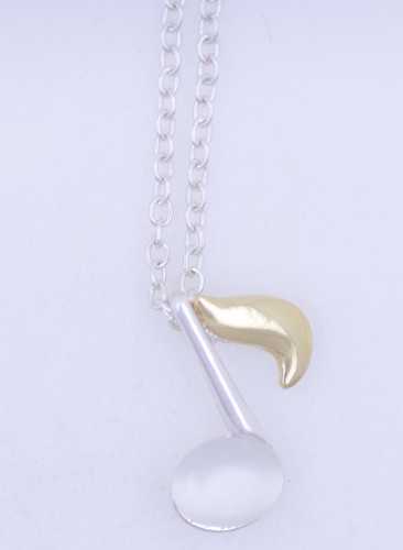 Cute white and gold coloured musical note necklace - Picture 2 of 2