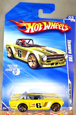 2010 Hot Wheels 131 Faster Than Ever 3/10 TRIUMPH TR6 Yellow Variation w/FTE Sp