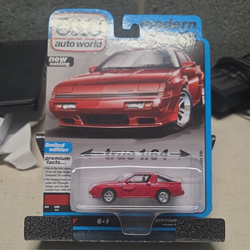 Auto World 1:64 1986 Dodge Conquest TSI Red