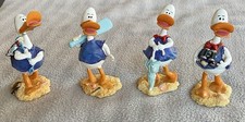 Set Of 4 Cute Ceramic Ducks With Wobbly Heads. Each Has Their Own Pastime.