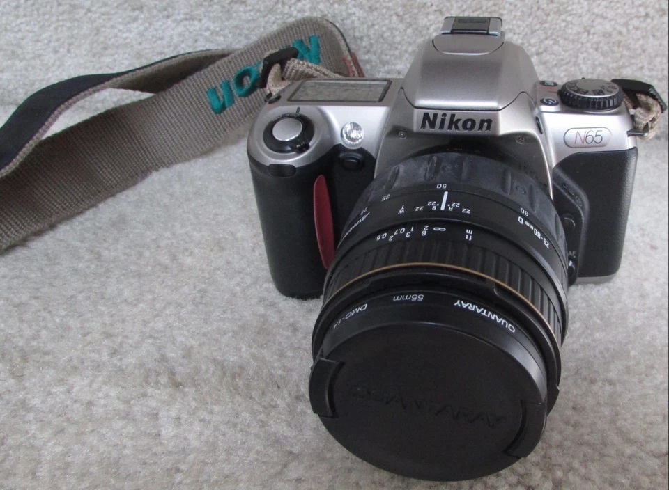 Nikon N65 35mm SLR Camera Package 2 Quantaray Lenses, Film, Bag - Image 2 of 4