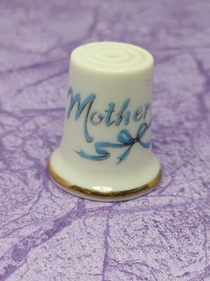 Vintage Thimble White Bone China, says  ''Mother'' with blue bow Gold Trim Gift