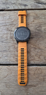 Garmin Fenix 7X Sapphire Solar GPS Watch 51mm Orange Black Bands Set