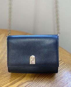 furla black bolsa with gold chain
