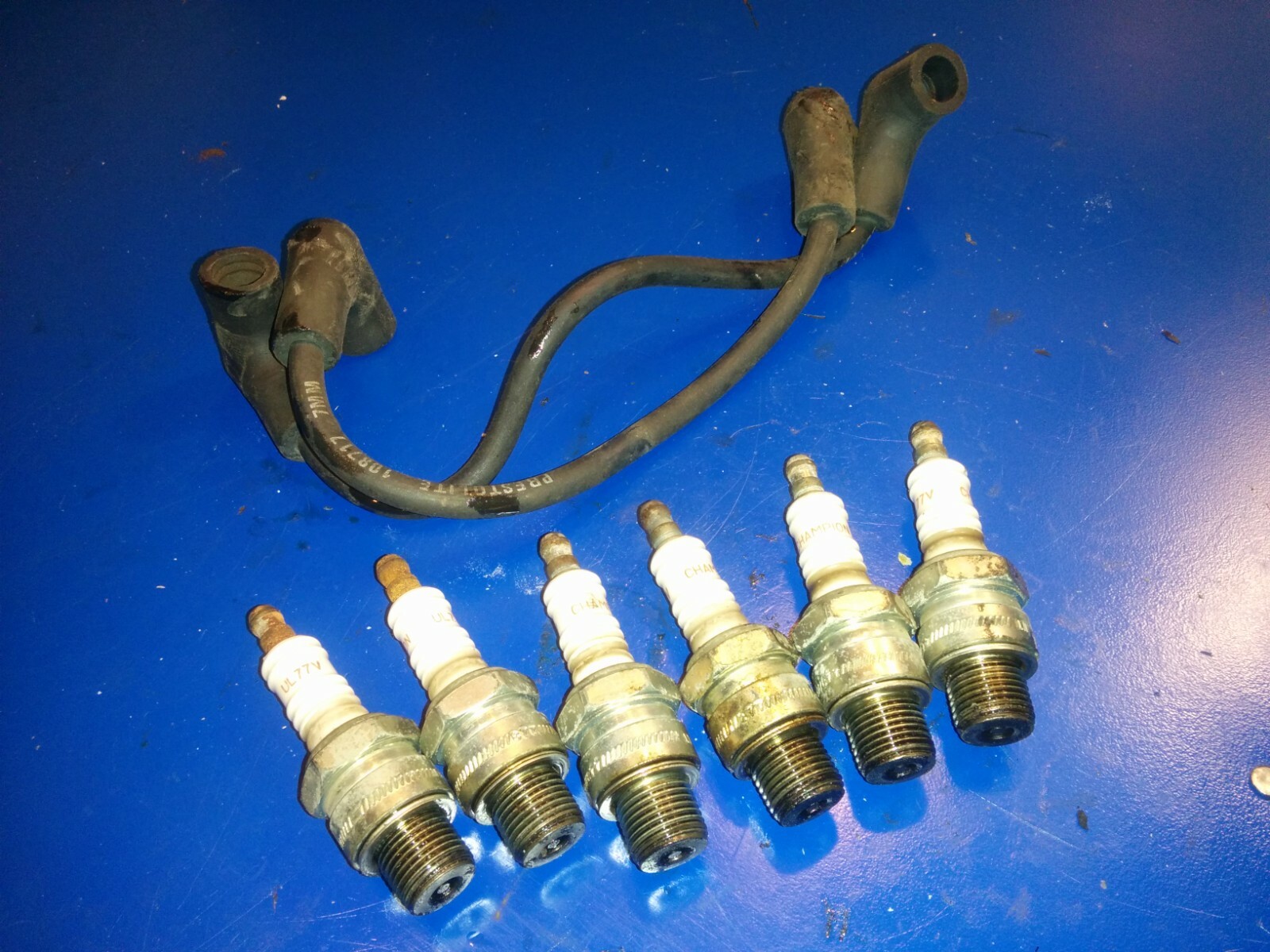 0582365 582365 LEAD 0581027 ul77v champion johnson evinrude omc 150hp 2 6e 