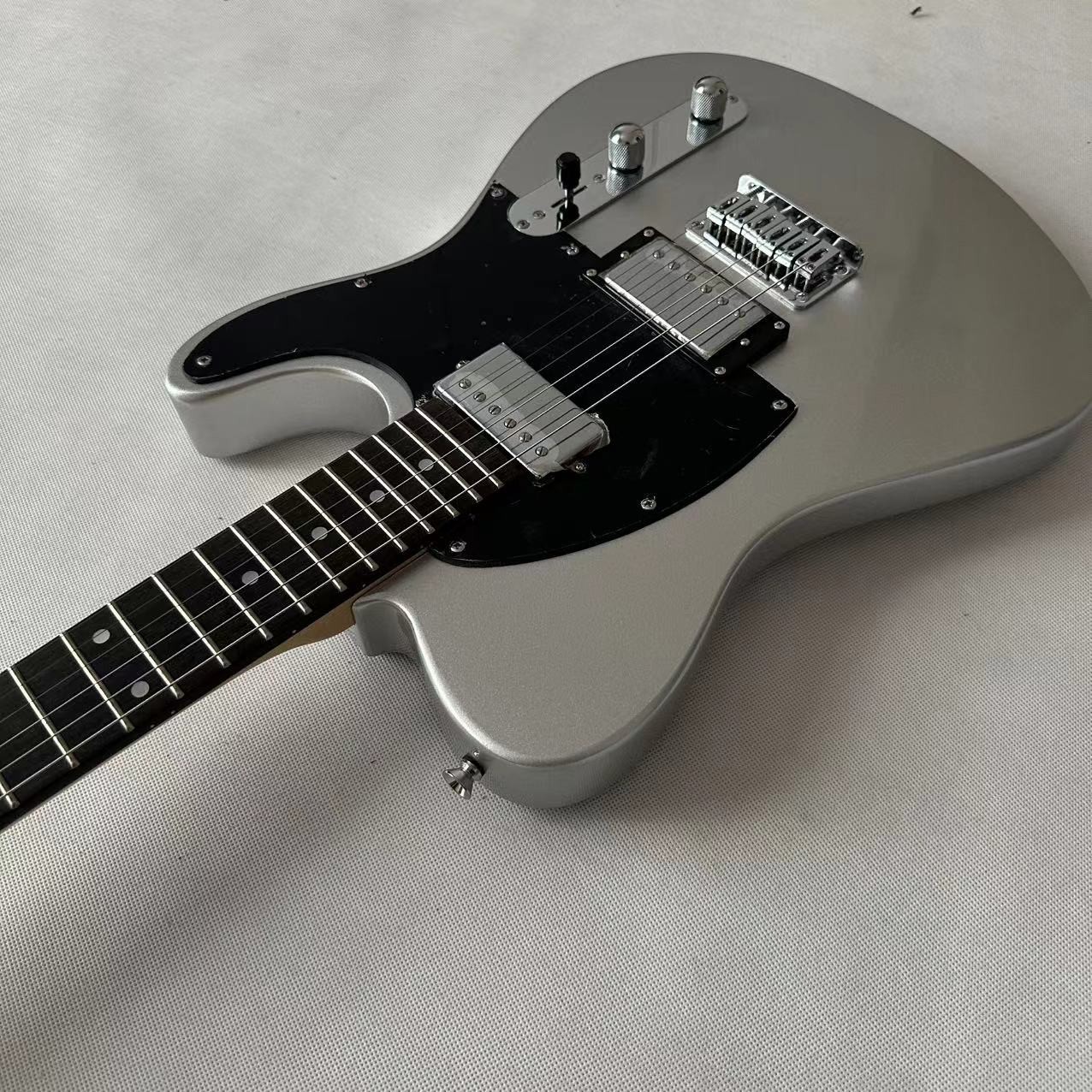 Silver powder white TL electric guitar, fixed bridge black protective plate, alternate view 3