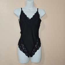 We are HAH Black Lace Back off Bodysuit X-Small