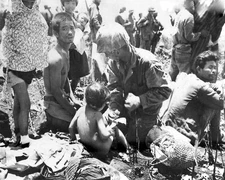 Navy Medic gives first aid to wounded boy World War II WWII WW2 8x10 Photo 807c