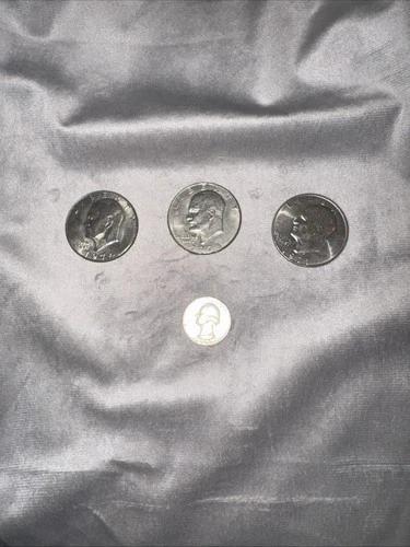 Three Beautiful Ike Dollars Bu Condition And A 1964 Silver Quarter XF Condition
