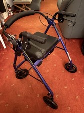 Rollator Walker 4-Wheel Mobility Aid with Red Seat, Storage, and Brakes