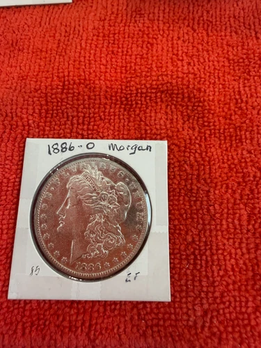 1886 -O.   $1 Morgan Silver Dollar. An extra  fine coin.  Uncertified.