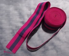 A 40 INCH LENGTH OF UNUSED OLD STOCK SILK DCM MEDAL RIBBON.