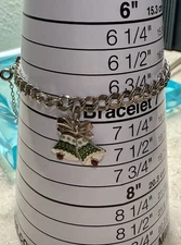 Vintage sterling silver Elco charm bracelet with Christmas belts bells 6.75”