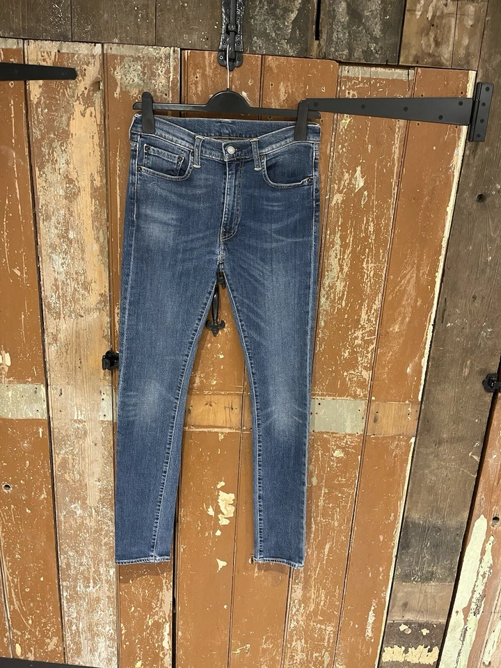 Pantalones de mezclilla Levi's 519 azul mezcla de algodón elástico cremallera logotipo informal para todos los días W33 L34 Foto 2 de 4