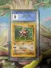 CGC 9 Pokemon TCG Hitmonchan Base Set 7 Holo Unlimited Holo Rare