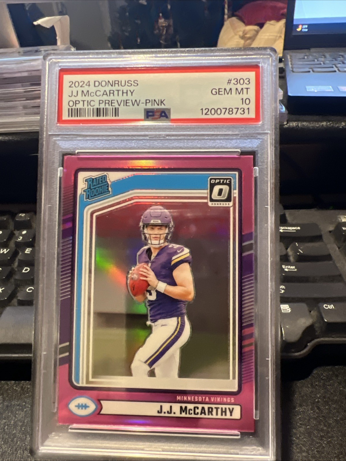 2024 Panini Donruss - Rated Rookie J.J. McCarthy #303 Optic Preview Pink PSA 10