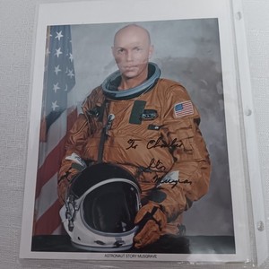 Signed Photo of Astronaut Story Musgrave, Autographed to "Charlie"
